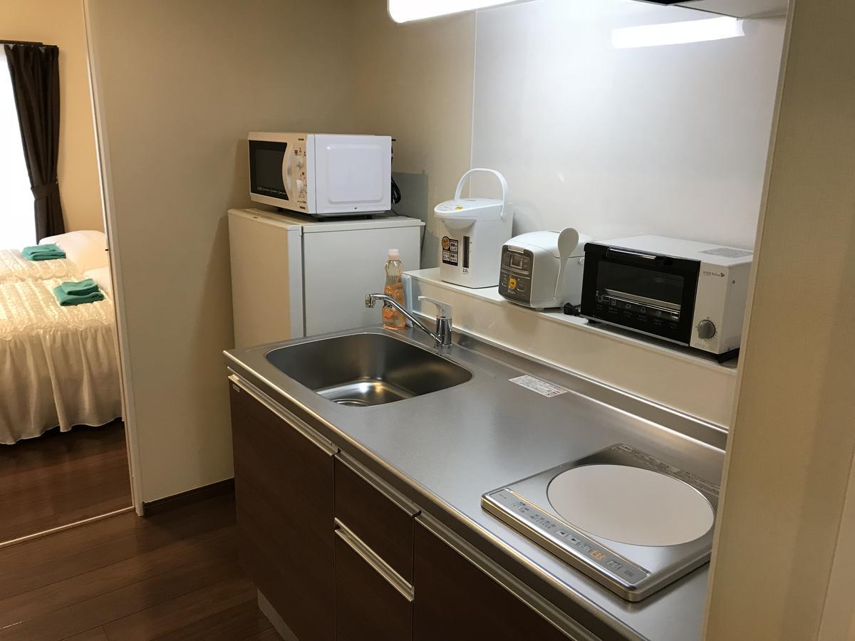 Weekly Harbourview Mansion Ginowan Apartamento Exterior foto